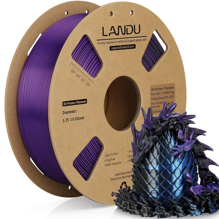 LANDU Tri-Color Black Blue Purple Silk PLA 3D printer filament 1kg spool alongside a glossy, color-shifting 3D printed dragon and egg.