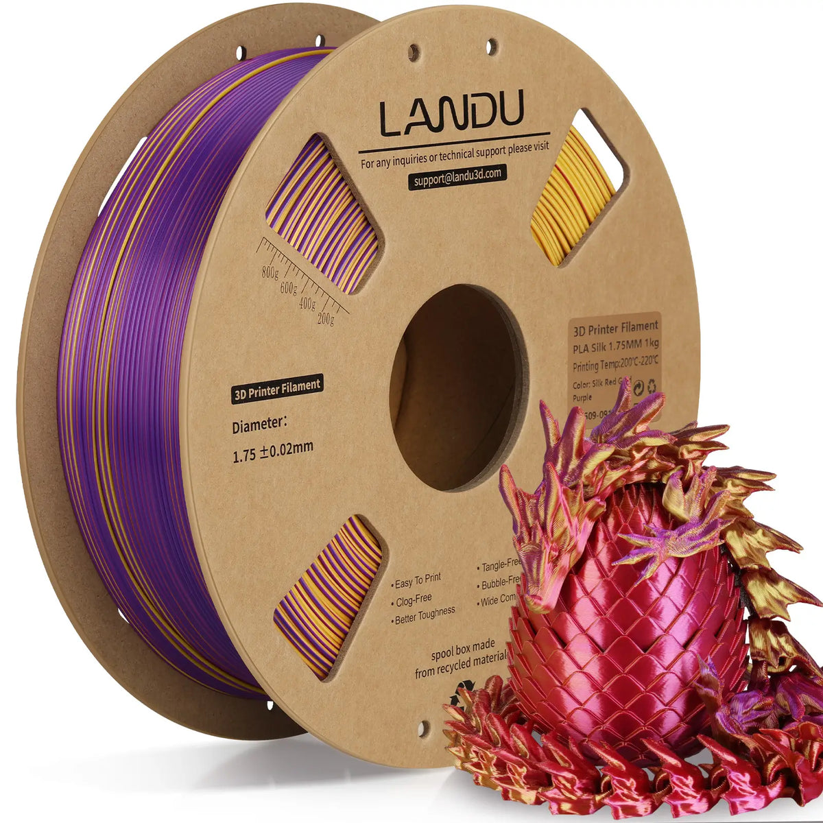LANDU Red Gold Purple Tri-Color Silk PLA 3D printer filament 1kg spool next to a regal sunset-hued color-shifting 3D printed dragon.
